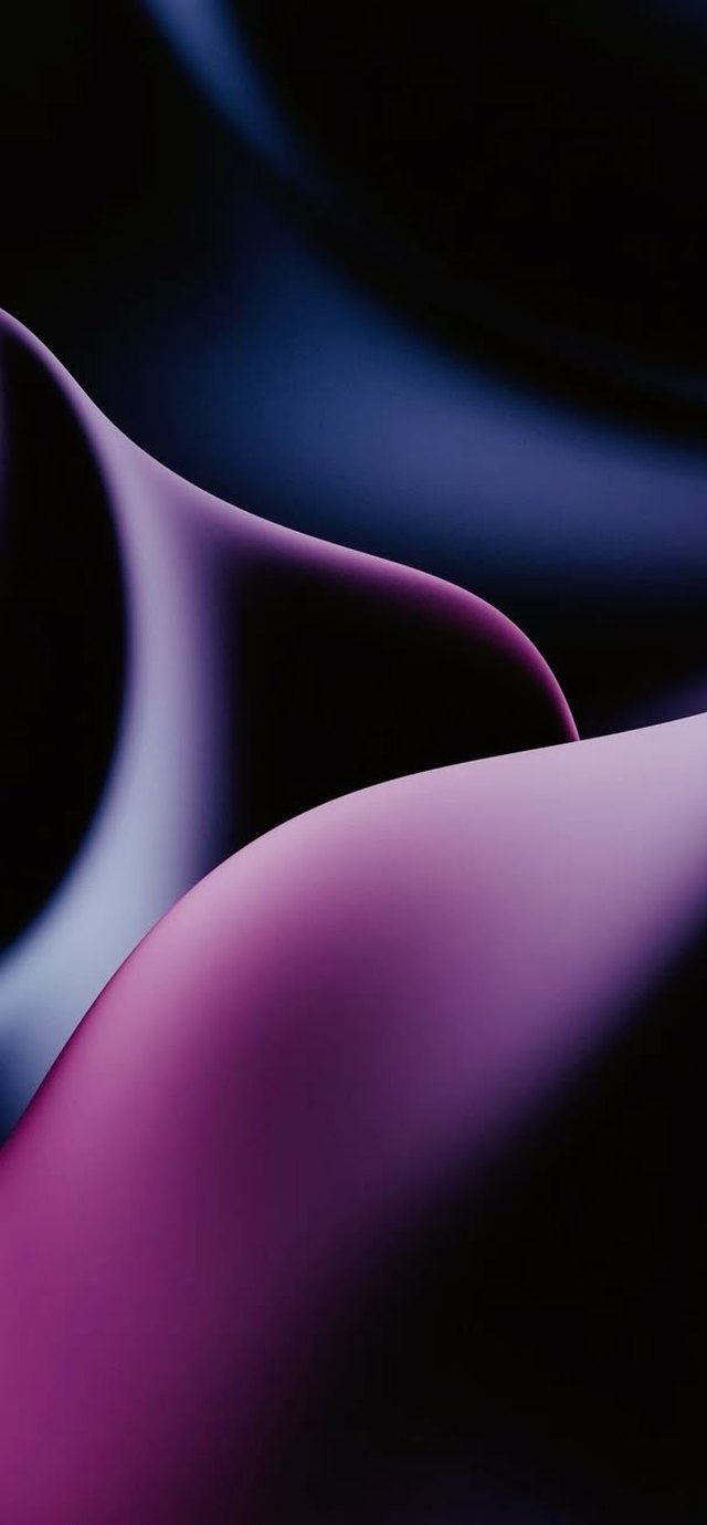 Abstract wallpaper with purple and blue silk folds lit from the edge